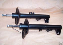 2x tlmiče predné BMW E36